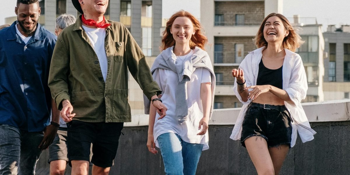 Three young individuals embarking on an adventure, symbolizing Meg, Charles Wallace, and Calvin's journey.