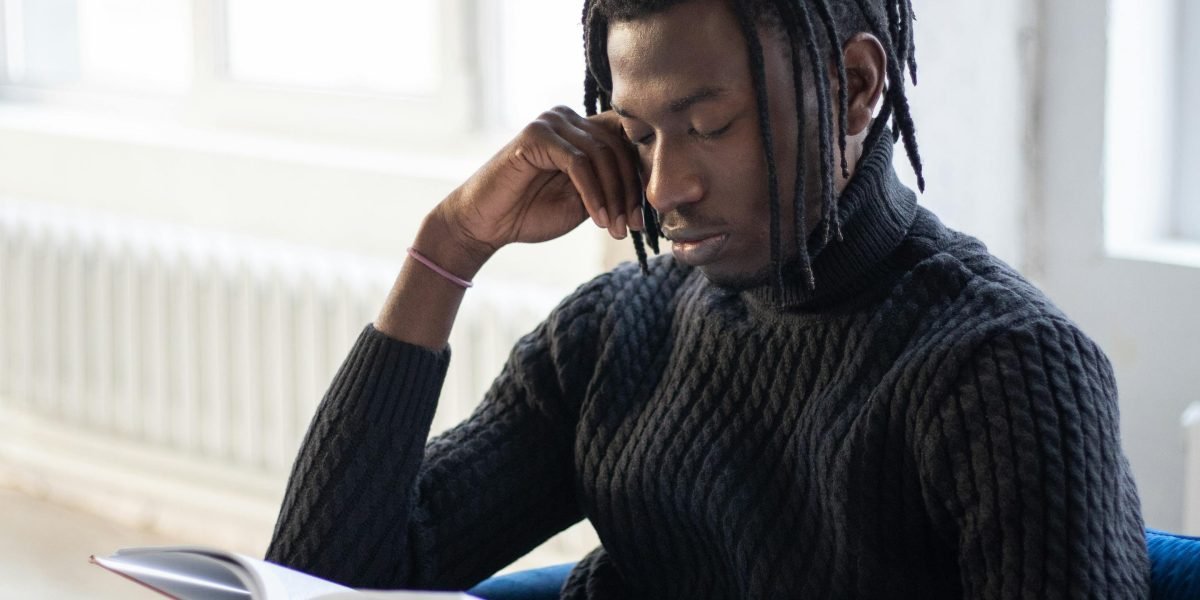 A reader thoughtfully engages with a classic novel, connecting with enduring themes across centuries.